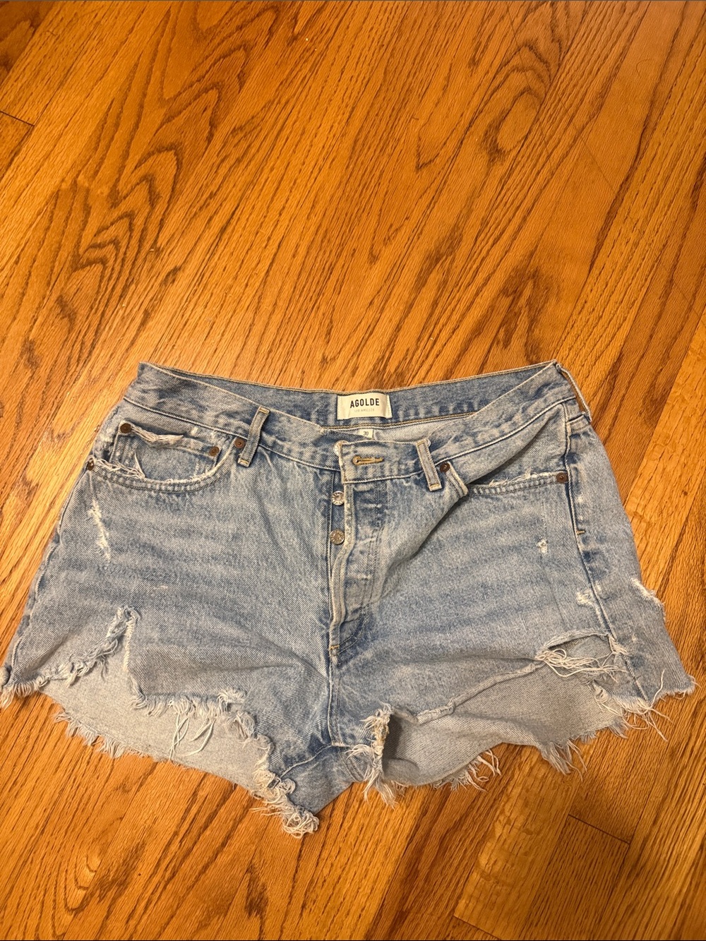 Agolde Faded Light Blue Distressed Denim Cutoff Shorts
